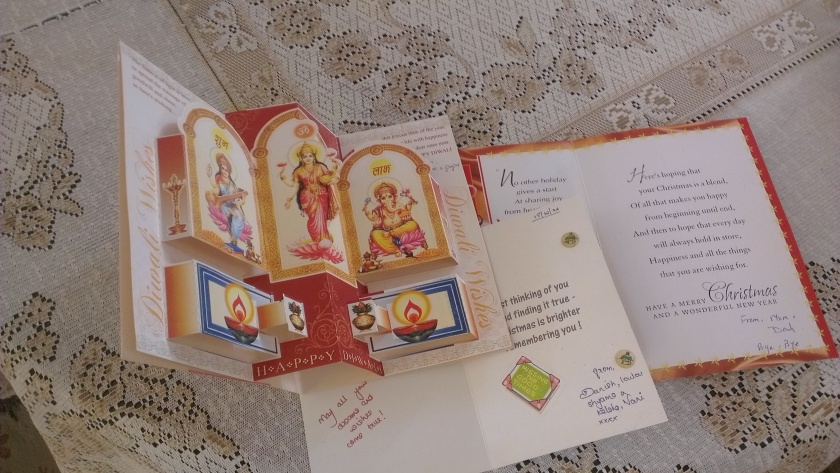 Collection of cards sent by Mom and Dad for Diwali and XMas, the miniature cute one sent by my neighbor.